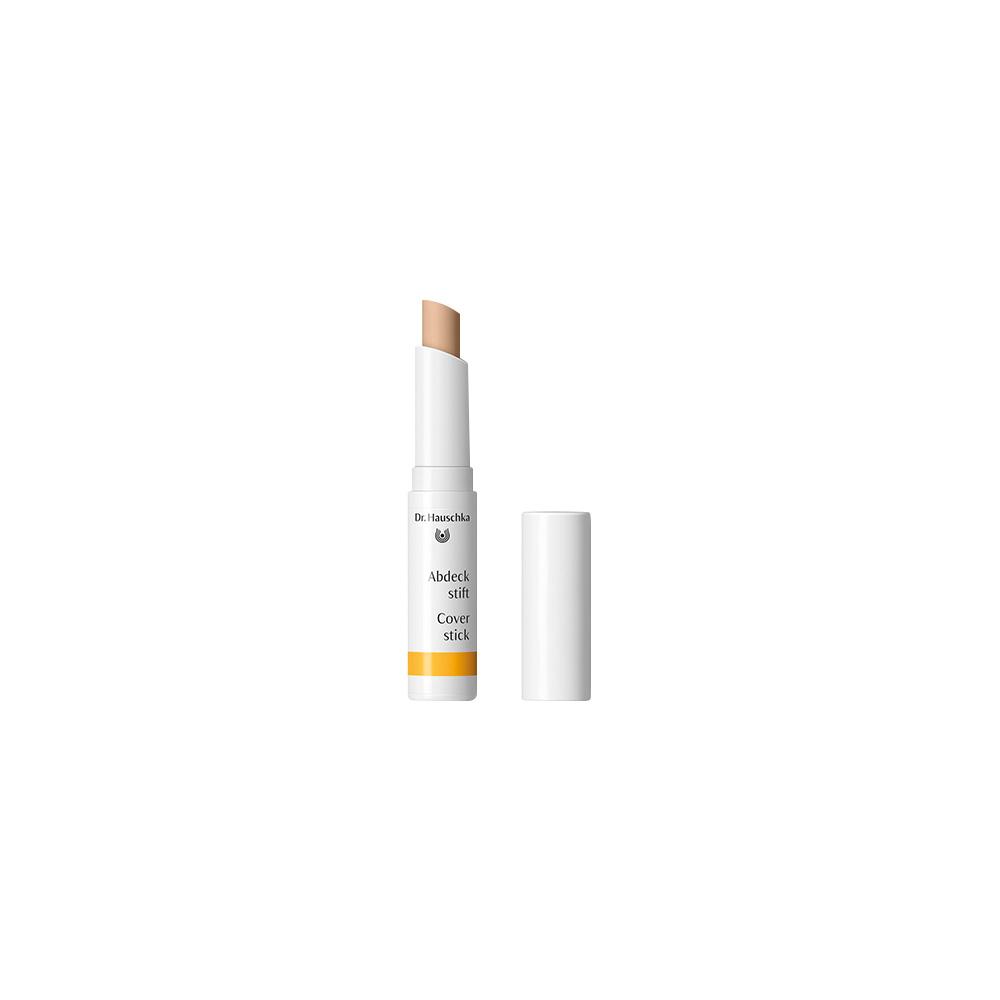Ein Abdeckstift mit geöffneter Kappe steht aufrecht.
